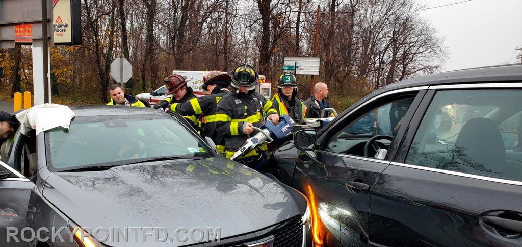 Members from R-4 & E-7 use Jaws of Life to free a trapped victim in a car