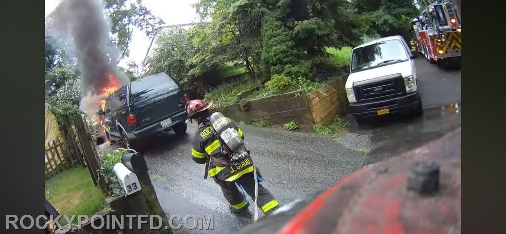 Vehicle Fire : Nozzle man from E-15 awaiting water. 
(Photo not mine)