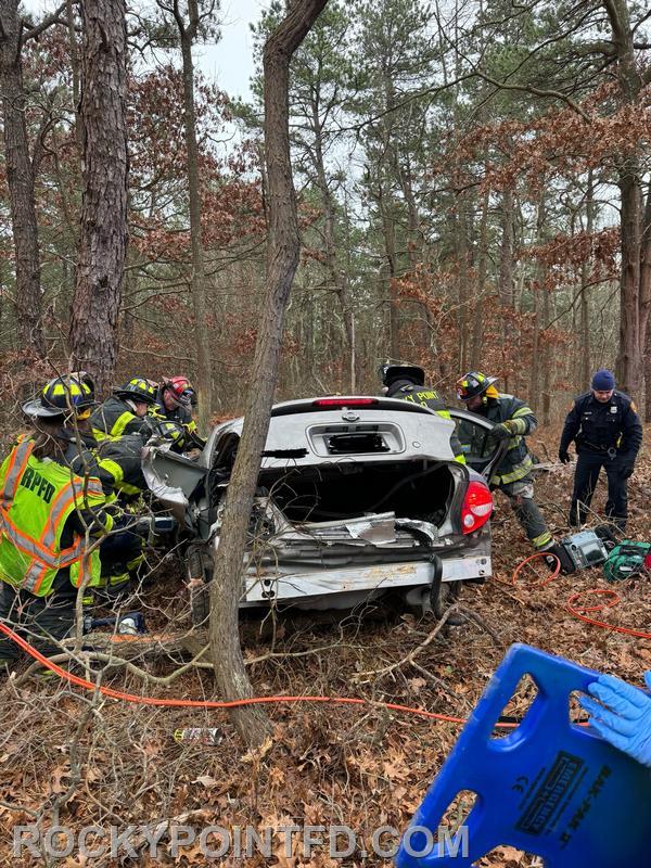 Motor Vehicle Accident: members from R-4 and TL-14 using Jaws of Life to feel tapped victim. 
2023